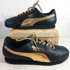 puma shoes gold and black